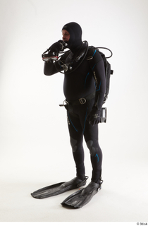 Jake Perry Diver with Scuba fitting mask standing whole body…